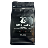 Black coffee bag with 'Rock Haven Coffee' branding on a white background