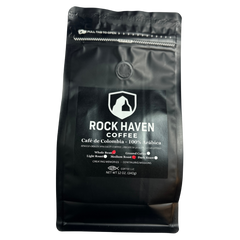 Black coffee bag with 'Rock Haven Coffee' branding on a white background