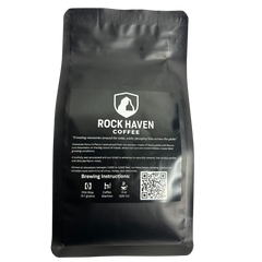 Black coffee bag with 'Rock Haven Coffee' branding on a white background
