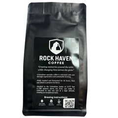 Black coffee bag with 'Rock Haven Coffee' branding and text on a white background